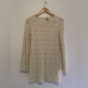 White lace dress with gold detail